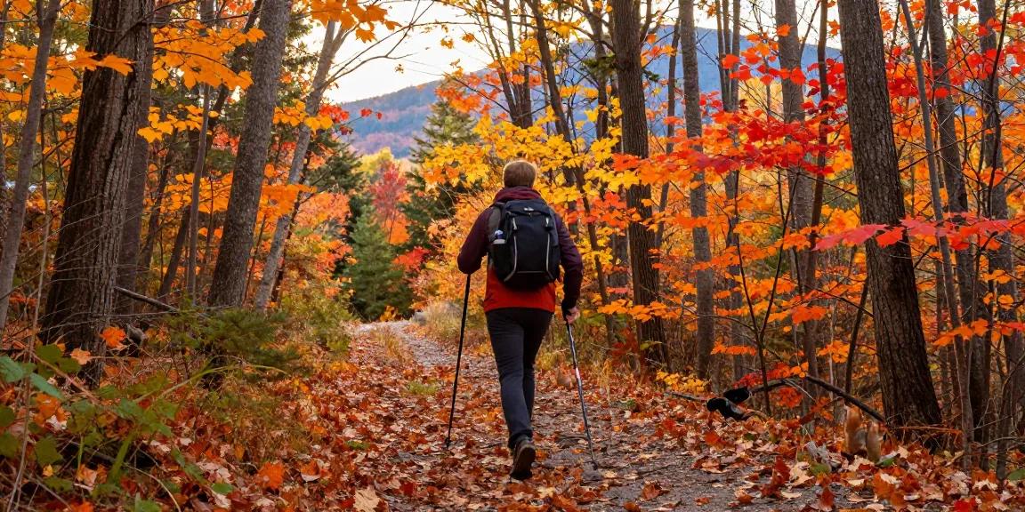 Serge Robichaud enjoying a fall hike in colorful New Brunswick woods.